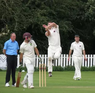 A man playing cricket
